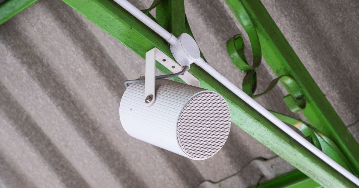 A white Ceiling speaker hanging