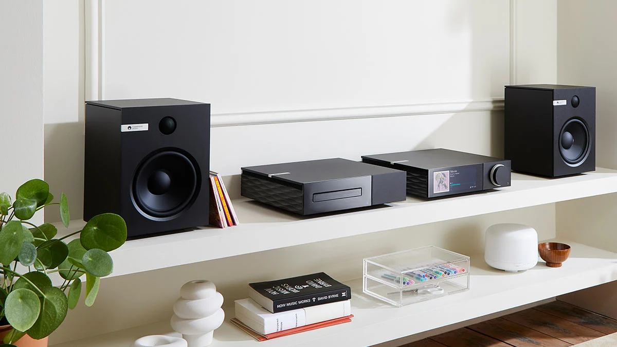 Stereo amplifier and bookshelf speakers matched correctly in a home listening room