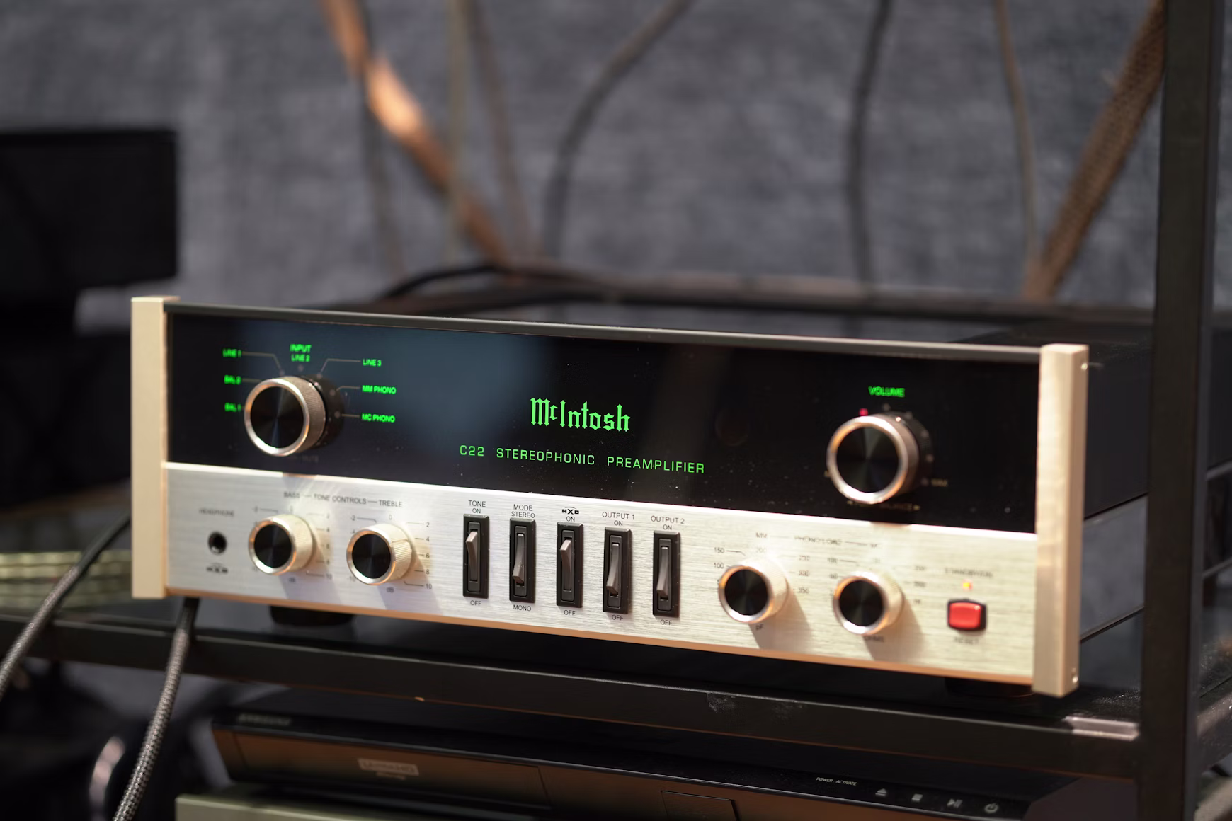 Best integrated amplifiers with phono input — vintage McIntosh stereophonic amplifier with phono controls on a hi-fi rack