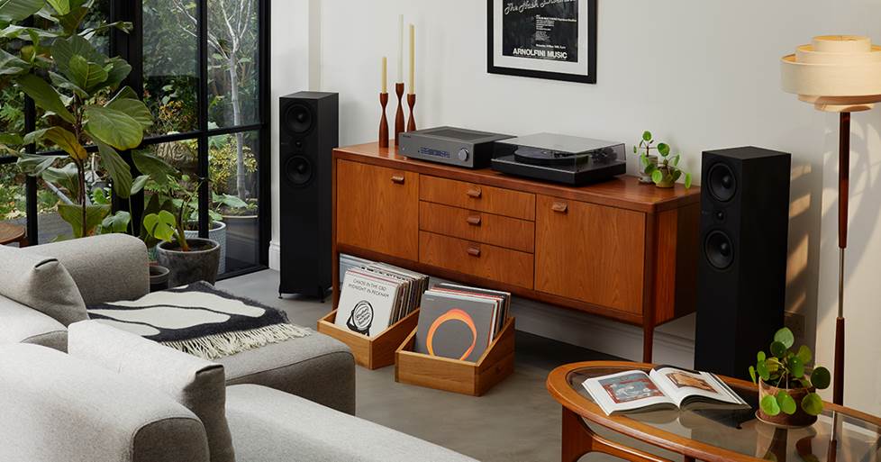 Entry-level amplifier and speaker setup in a modest living room listening space